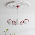 Crimson Curve skleněné závěsné světlo ve tvaru koule Solara Luxe
